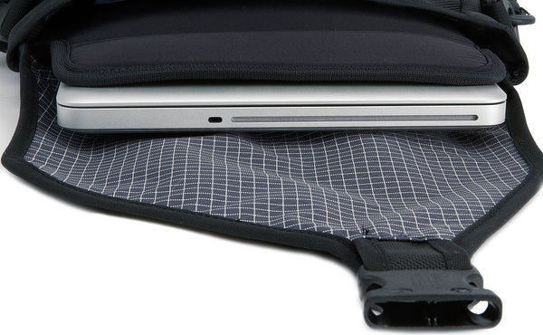 A close shot of a laptop in the padded sleeve of the Ristretto.